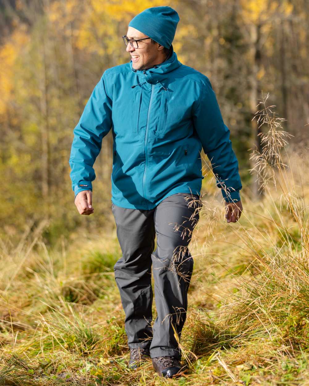 Dark Anthracite Coloured Pinewood Mens Telluz Trousers on forest background 