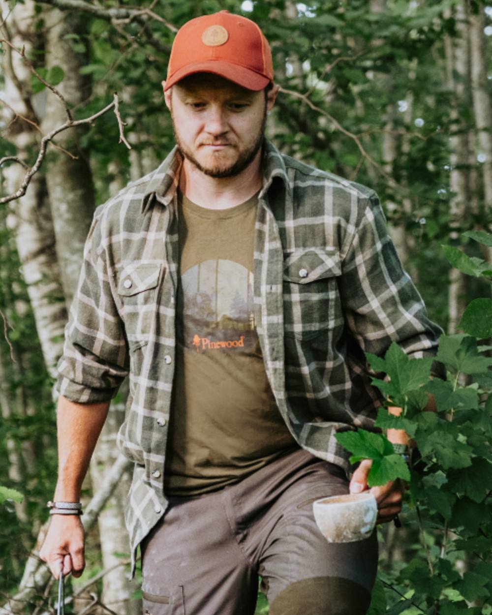 Olive coloured Pinewood Mens Wild Boar T-Shirt on forest background 