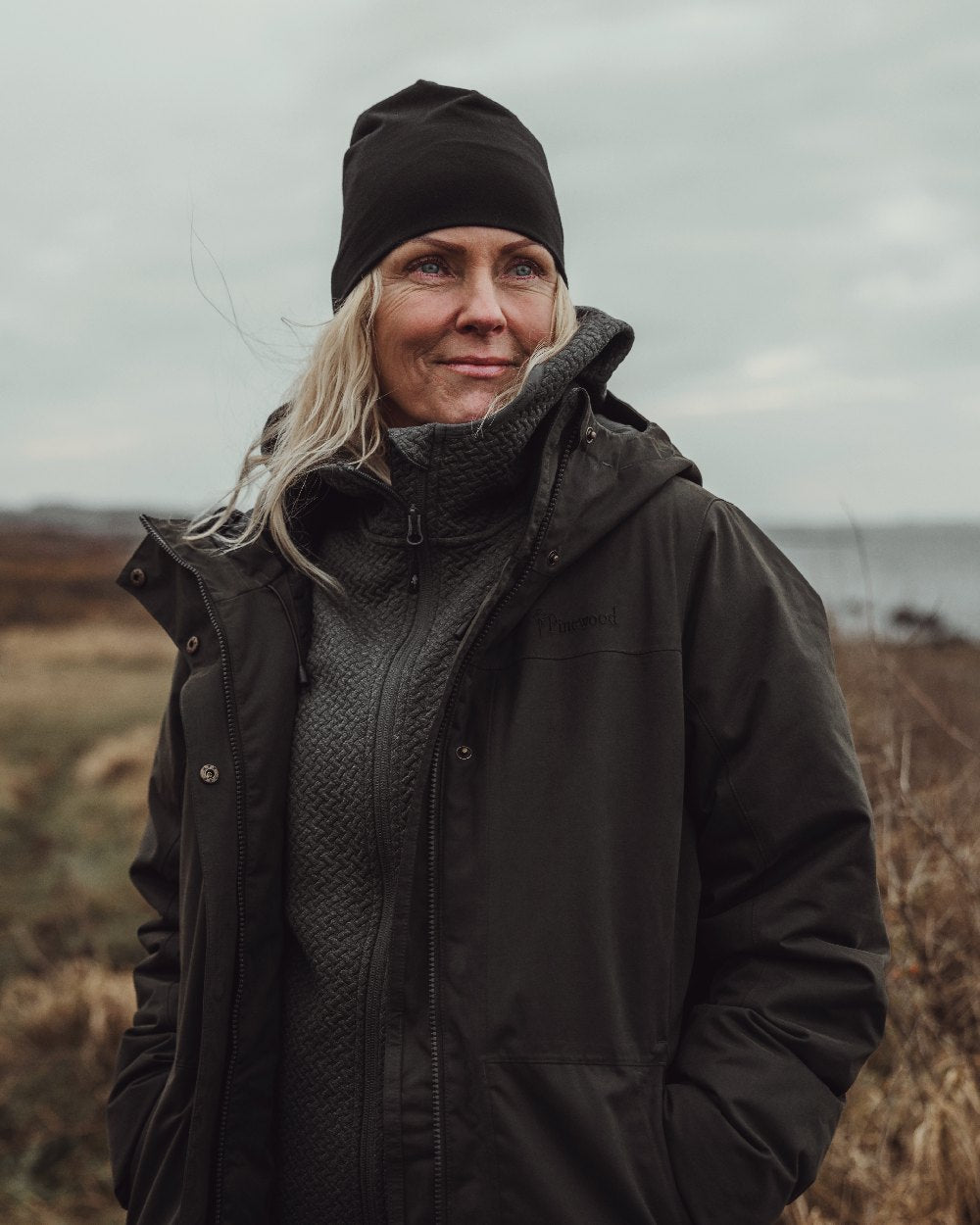 Black Coloured Pinewood Merino Wool Beanie on outdoor background 