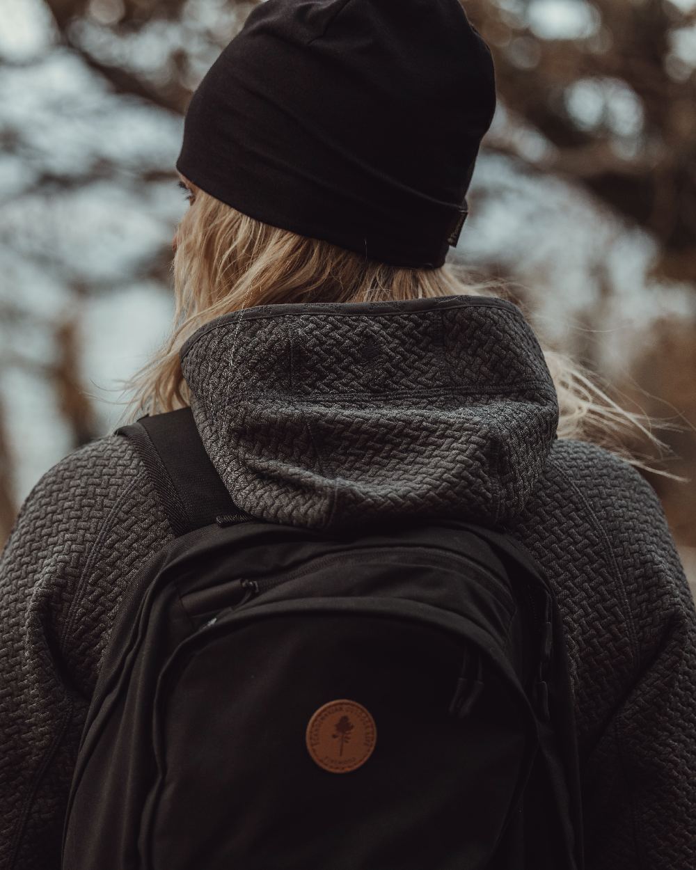 Black Coloured Pinewood Merino Wool Beanie on outdoor background 