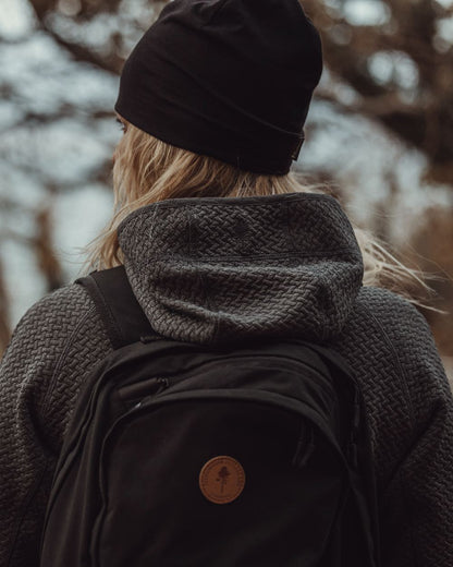 Black Coloured Pinewood Merino Wool Beanie on outdoor background 