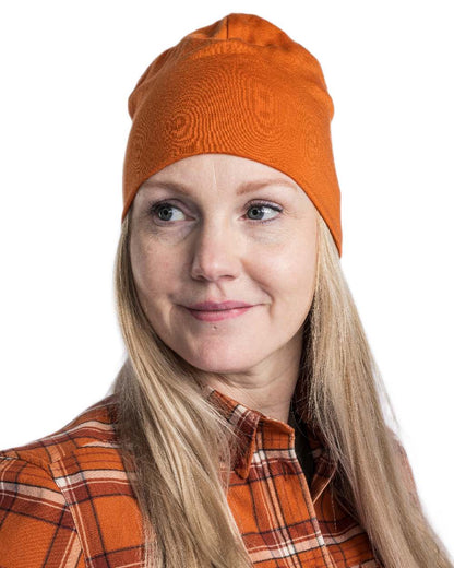 Burned Orange Coloured Pinewood Merino Wool Beanie on white background 