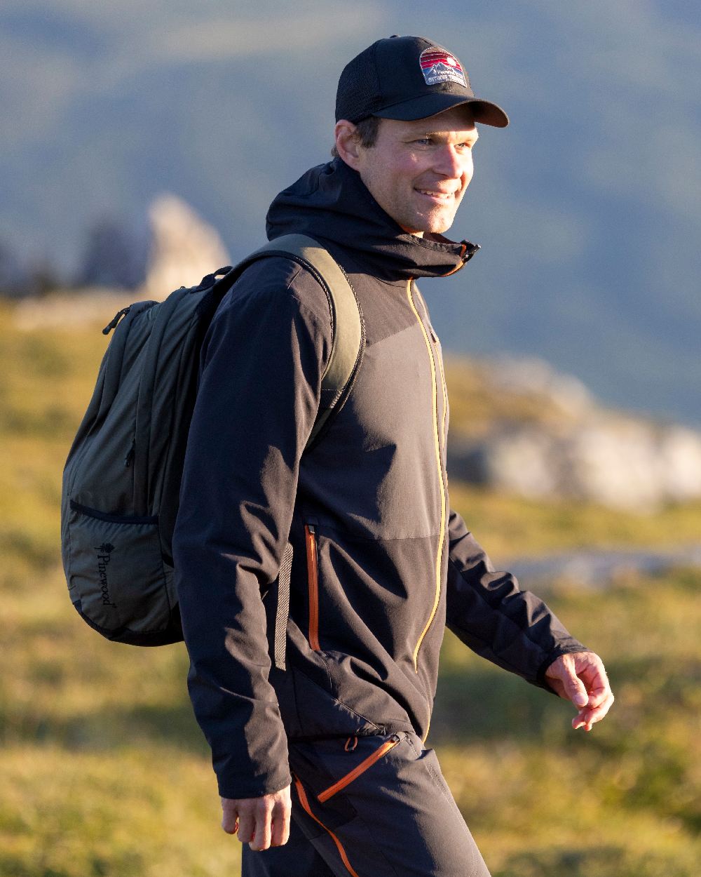 Black Coloured Pinewood Mesh Cap on outdoor background 