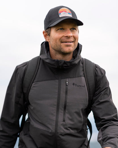 Black Coloured Pinewood Mesh Cap on outdoor background 