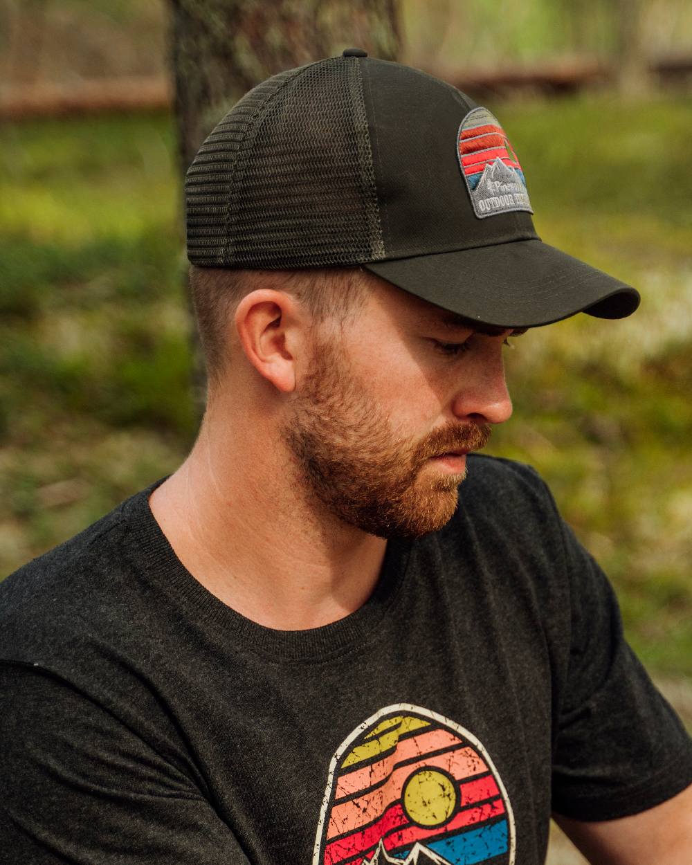 Moss Green Coloured Pinewood Mesh Cap on outdoor background 