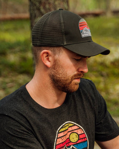 Moss Green Coloured Pinewood Mesh Cap on outdoor background 