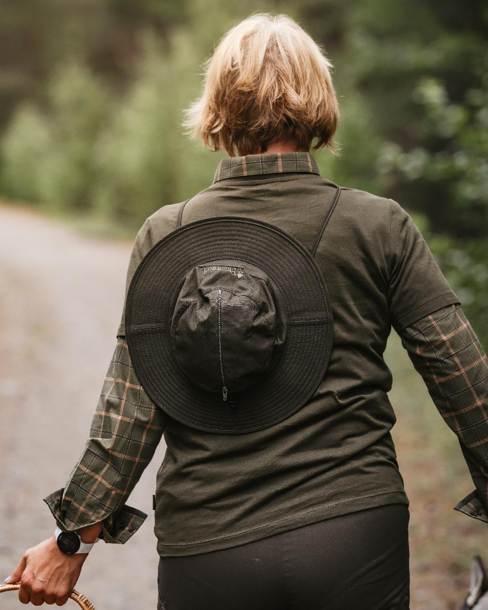 Dark Olive Coloured Pinewood Mosquito Hat on outdoor background 