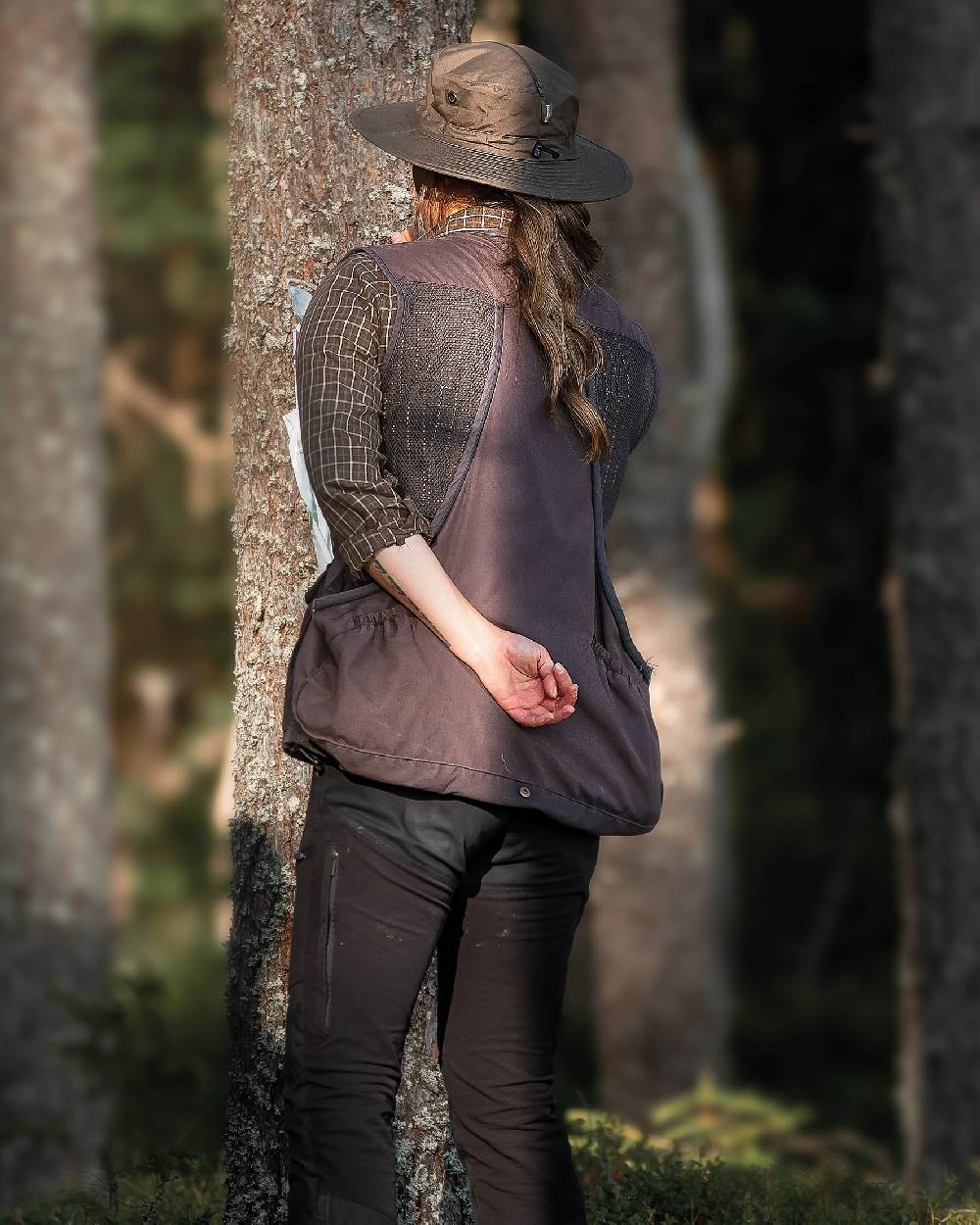 Moss Green Coloured Pinewood Mosquito Hat on outdoor background 