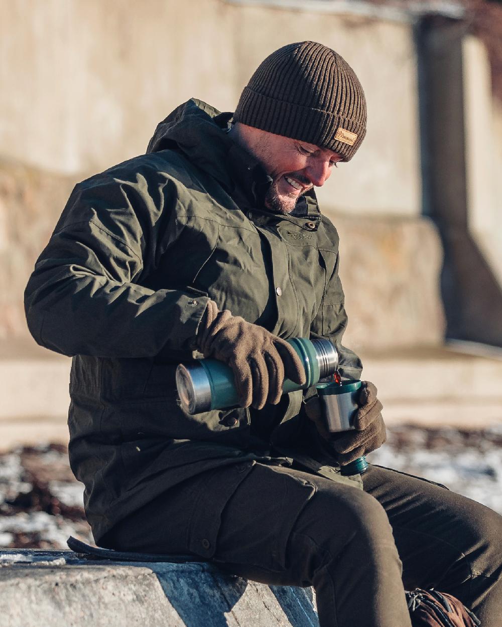 Green Coloured Pinewood New Stoten Hat on outdoor background 