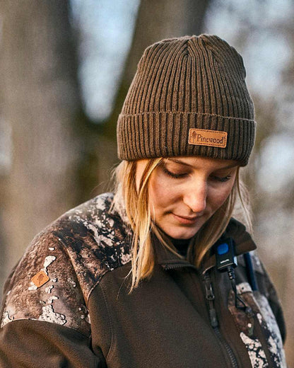 Green Coloured Pinewood New Stoten Hat on outdoor background 