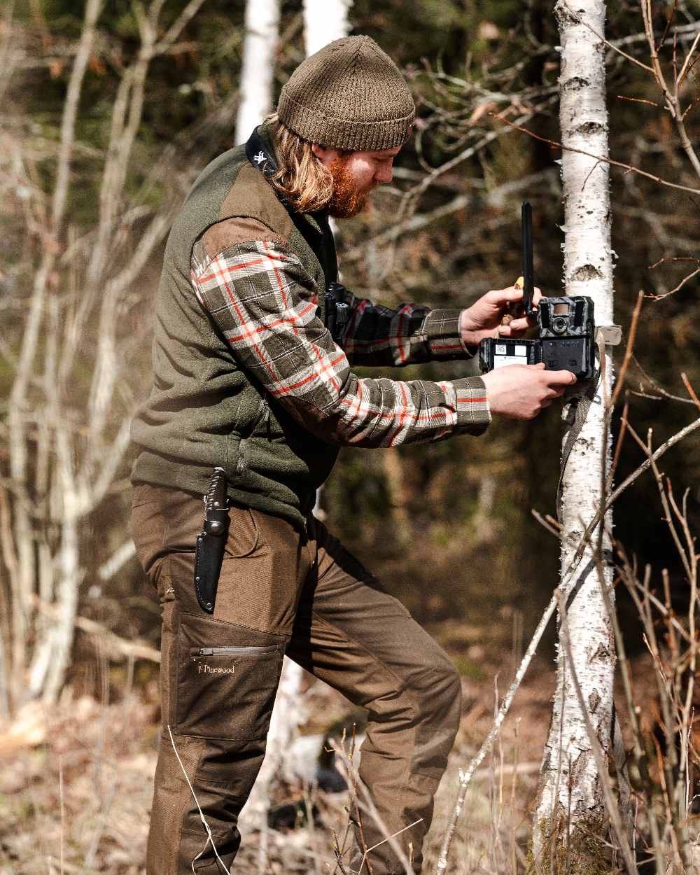 Green Coloured Pinewood New Stoten Hat on outdoor background 