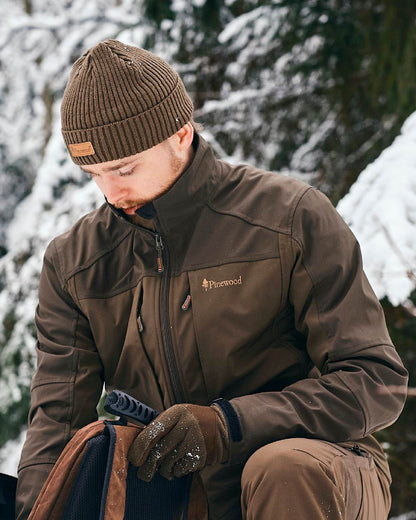 Green Coloured Pinewood New Stoten Hat on outdoor background 