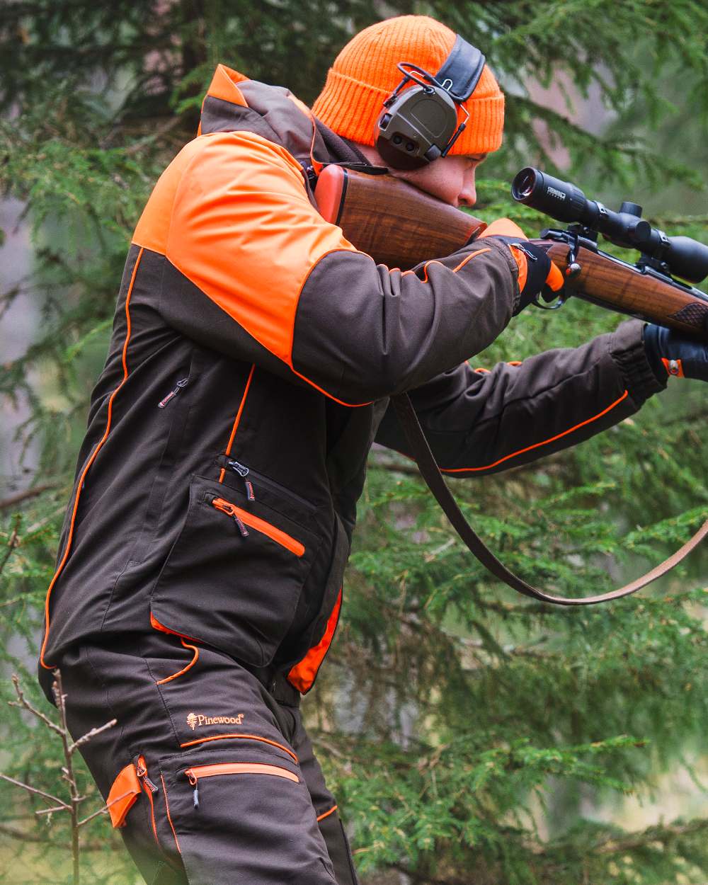 Orange Coloured Pinewood New Stoten Hat on outdoor background 