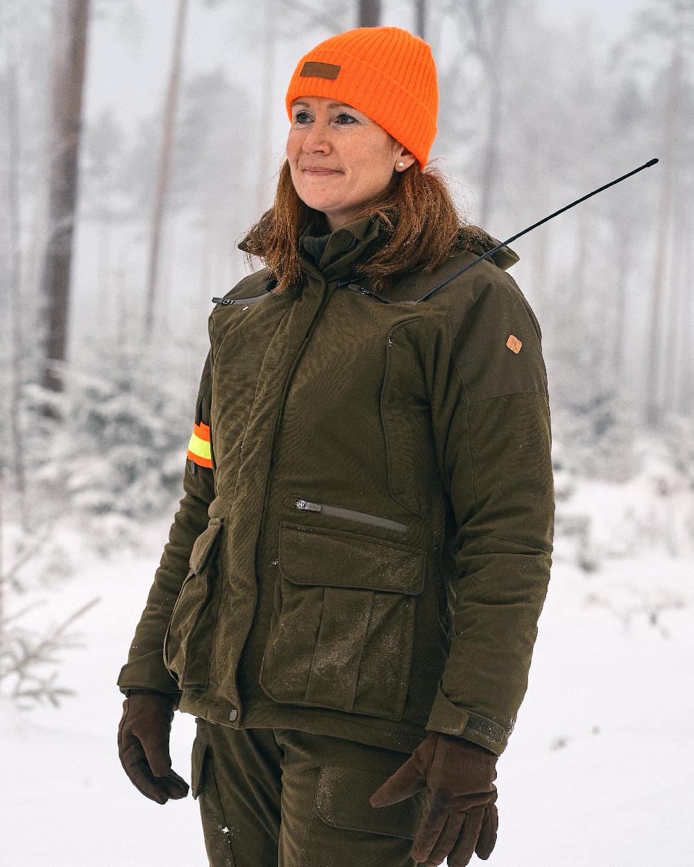 Orange Coloured Pinewood New Stoten Hat on outdoor background 