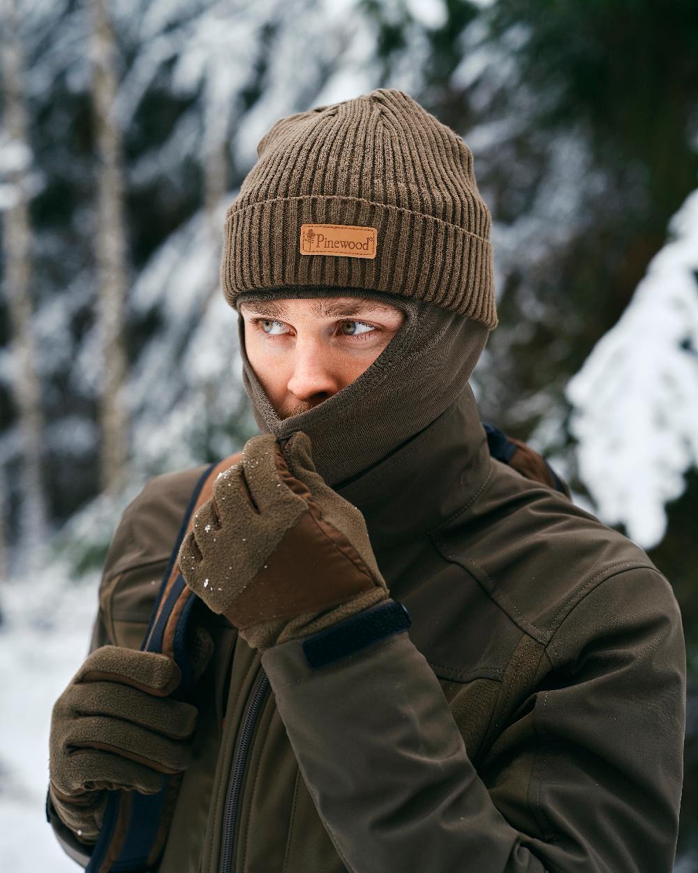 Hunting Brown Suede Brown Coloured Pinewood Smaland Hunters Extreme Fleece Gloves on snow background 