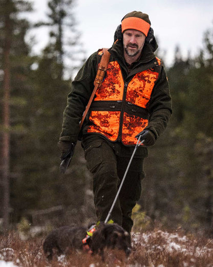 Mossgreen Orange Coloured Pinewood Smaland Reversible Hunters Hat on outdoor background 