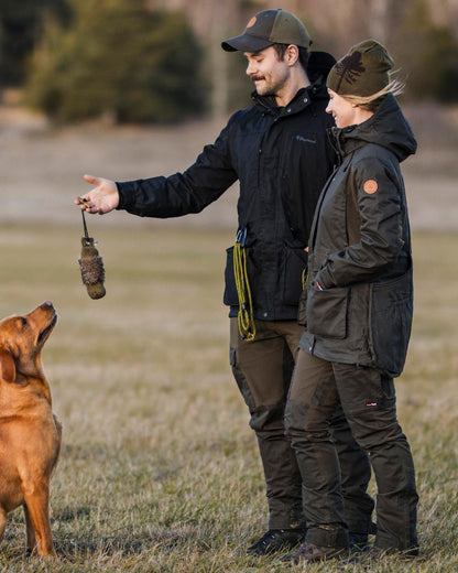 Orange Green Coloured Pinewood Tree Hat on outdoor background 