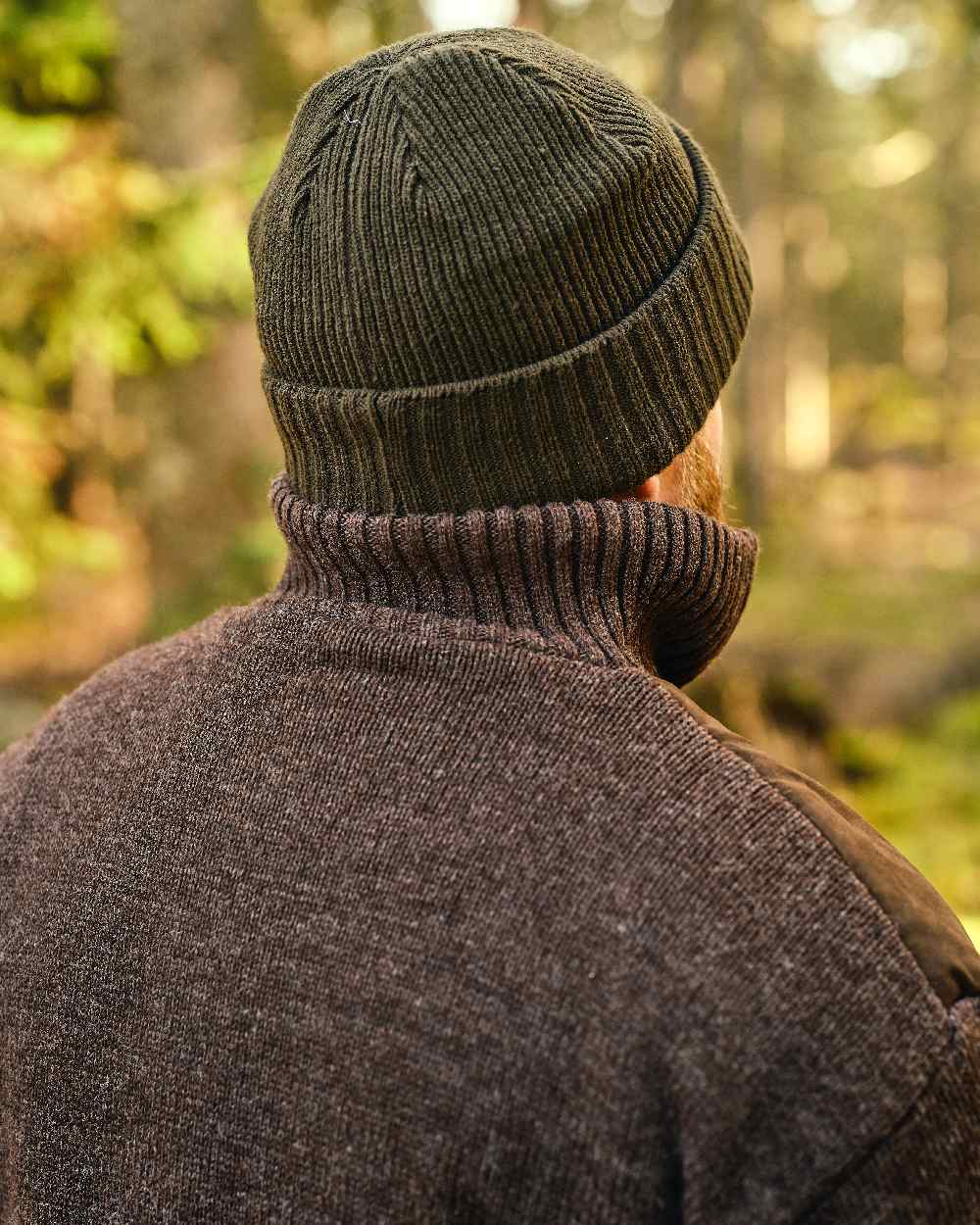 Moss Green Coloured Pinewood Windy Hat on outdoor background 