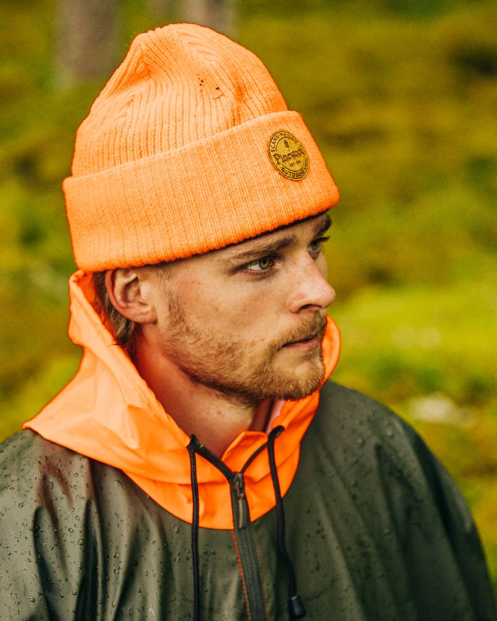 Orange Coloured Pinewood Windy Hat on outdoor background 