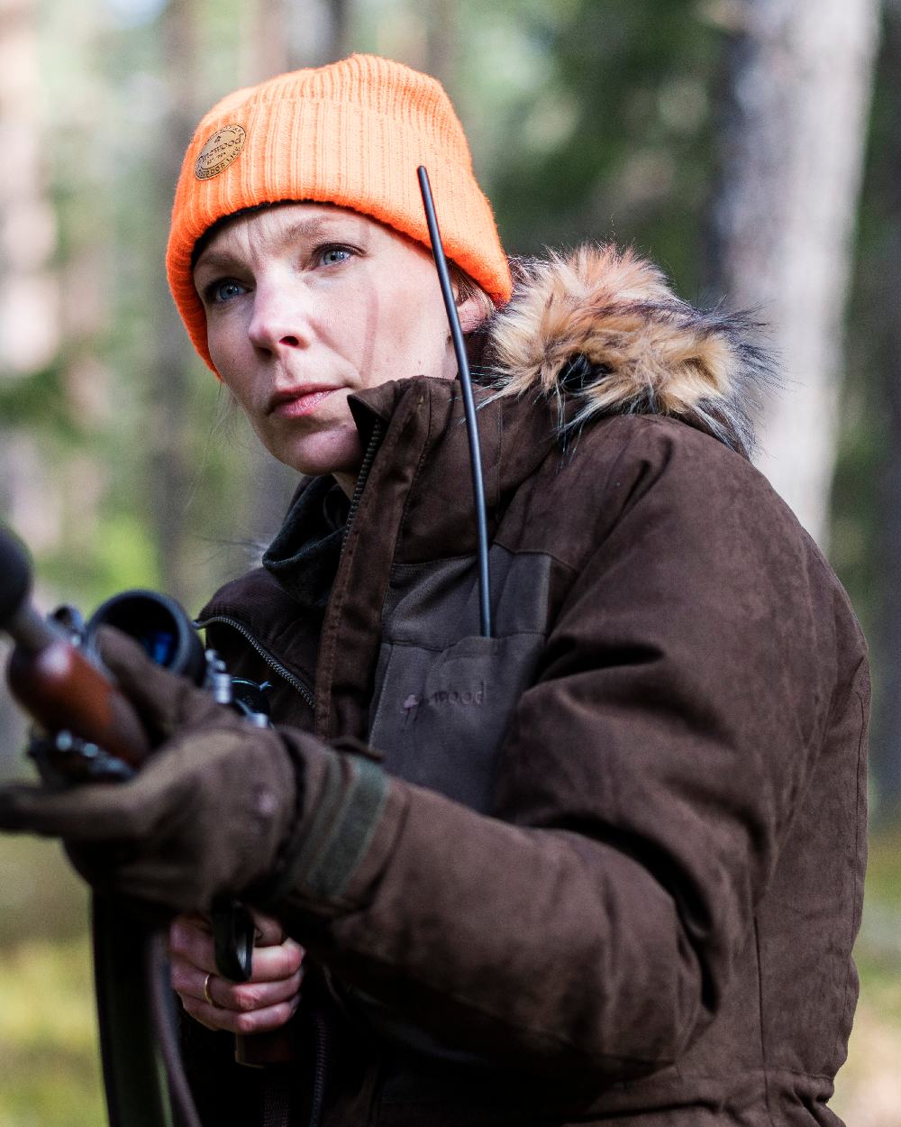 Orange Coloured Pinewood Windy Hat on outdoor background 
