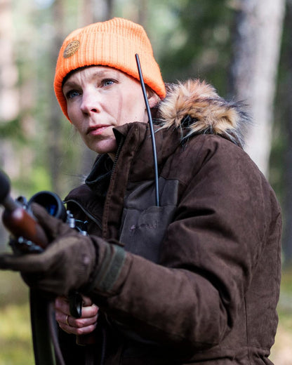 Orange Coloured Pinewood Windy Hat on outdoor background 