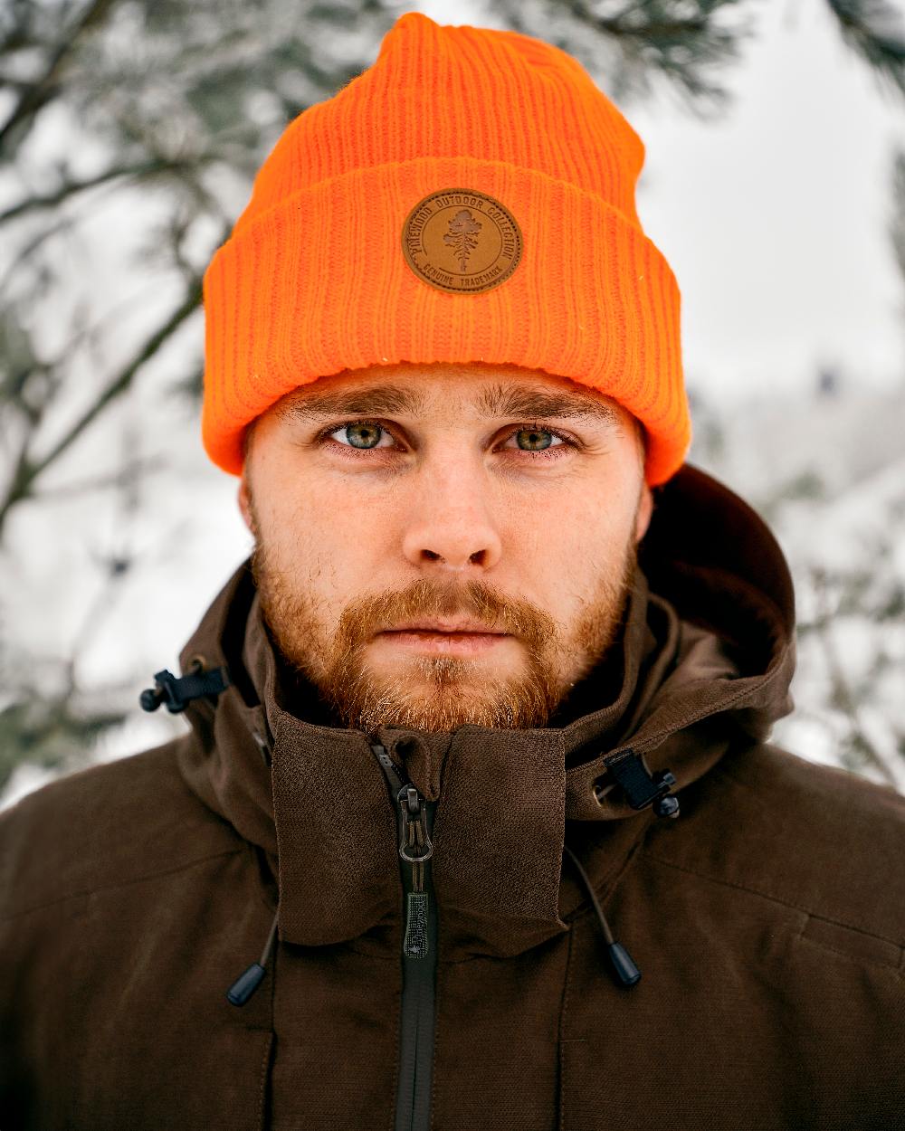 Orange Coloured Pinewood Windy Hat on outdoor background 