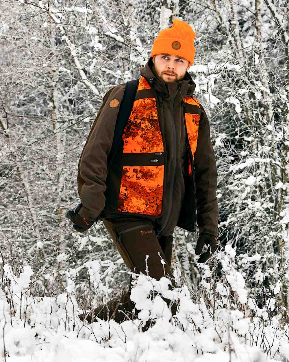 Orange Coloured Pinewood Windy Hat on outdoor background 