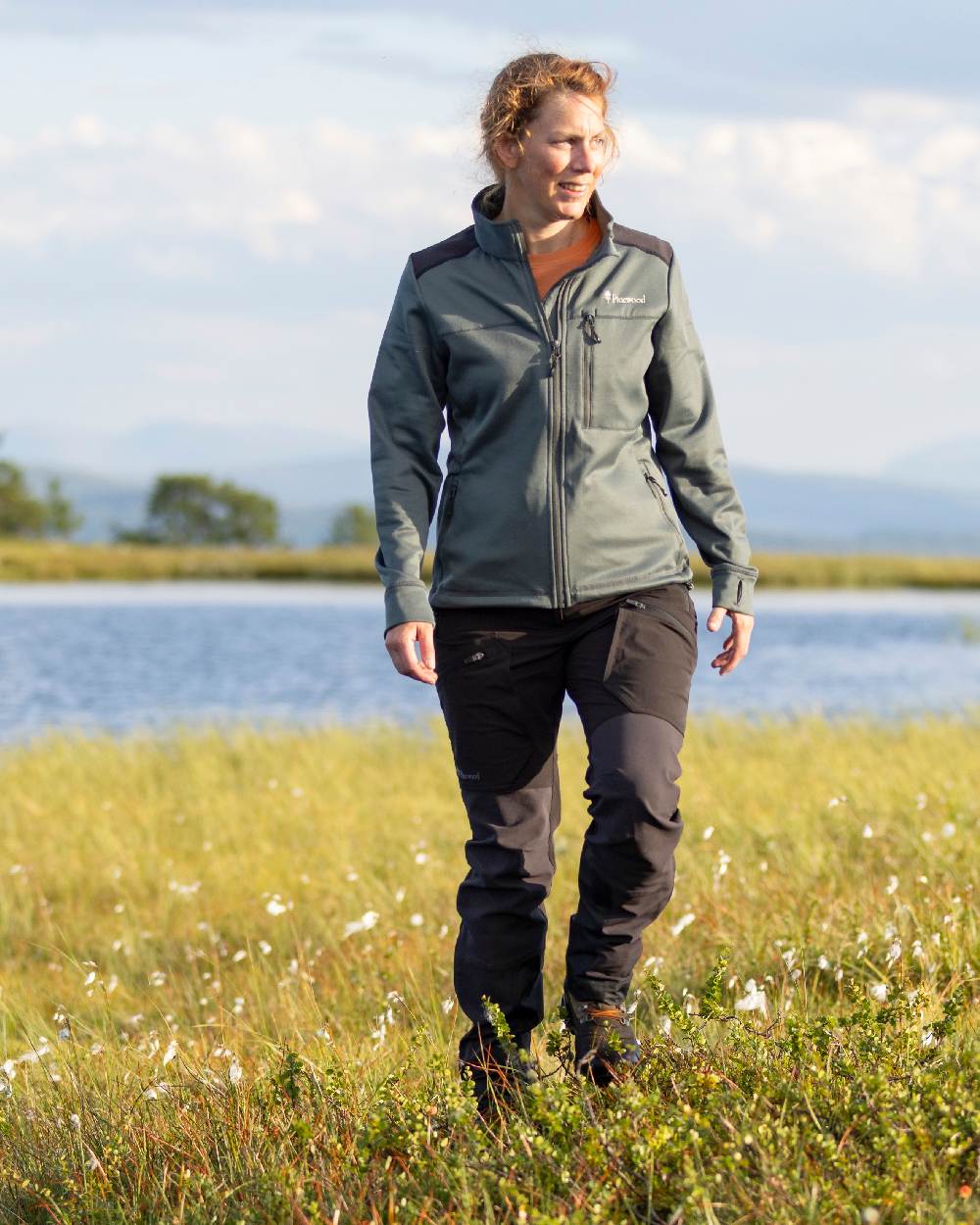 Black Coloured Pinewood Womens Abisko Adventure Trousers on outdoor background 