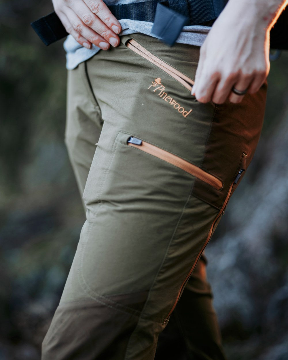 Leaf Hunting Olive Coloured Pinewood Womens Abisko Brenton Trousers on outdoor background 