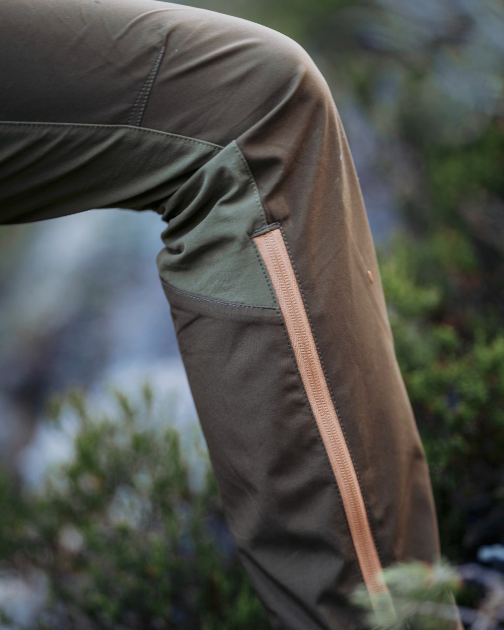 Leaf Hunting Olive Coloured Pinewood Womens Abisko Brenton Trousers on outdoor background 