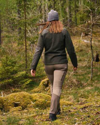 Mole Brown Coloured Pinewood Womens Abisko Brenton Trousers on forest background 