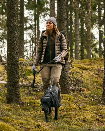 Mole Brown Coloured Pinewood Womens Abisko Brenton Trousers on forest background 
