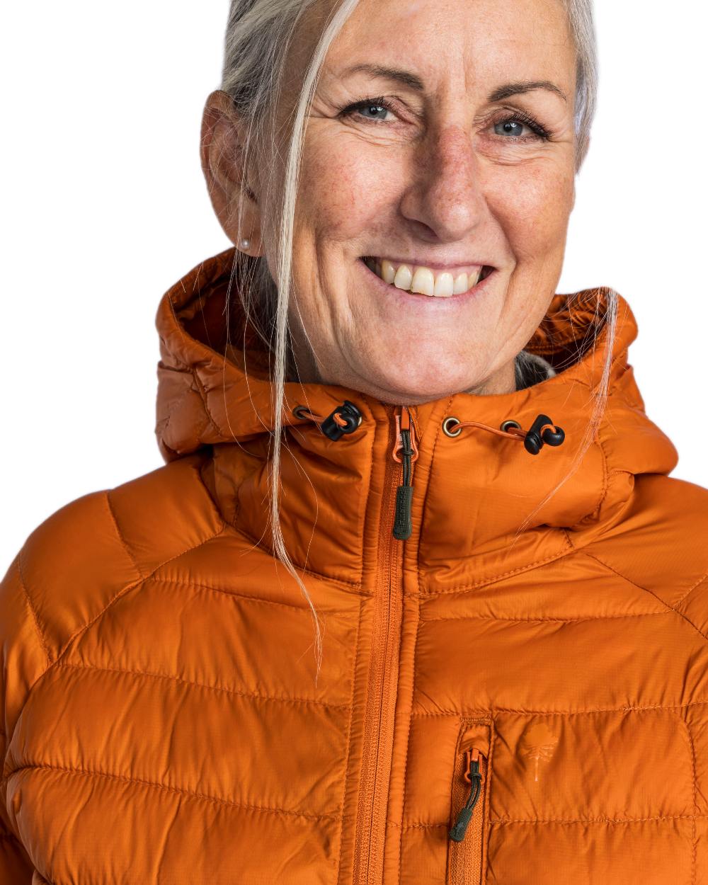 Burned Orange Coloured Pinewood Womens Abisko Insulation Jacket on white background 