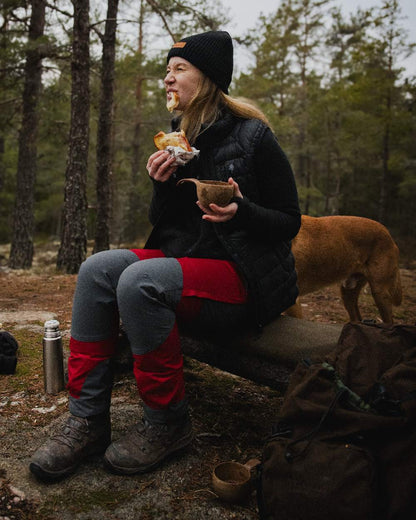 Black Coloured Pinewood Womens Abisko Insulation Vest on forest background 
