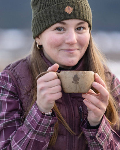 Earth Plum Coloured Pinewood Womens Abisko Insulation Vest on outdoor background 