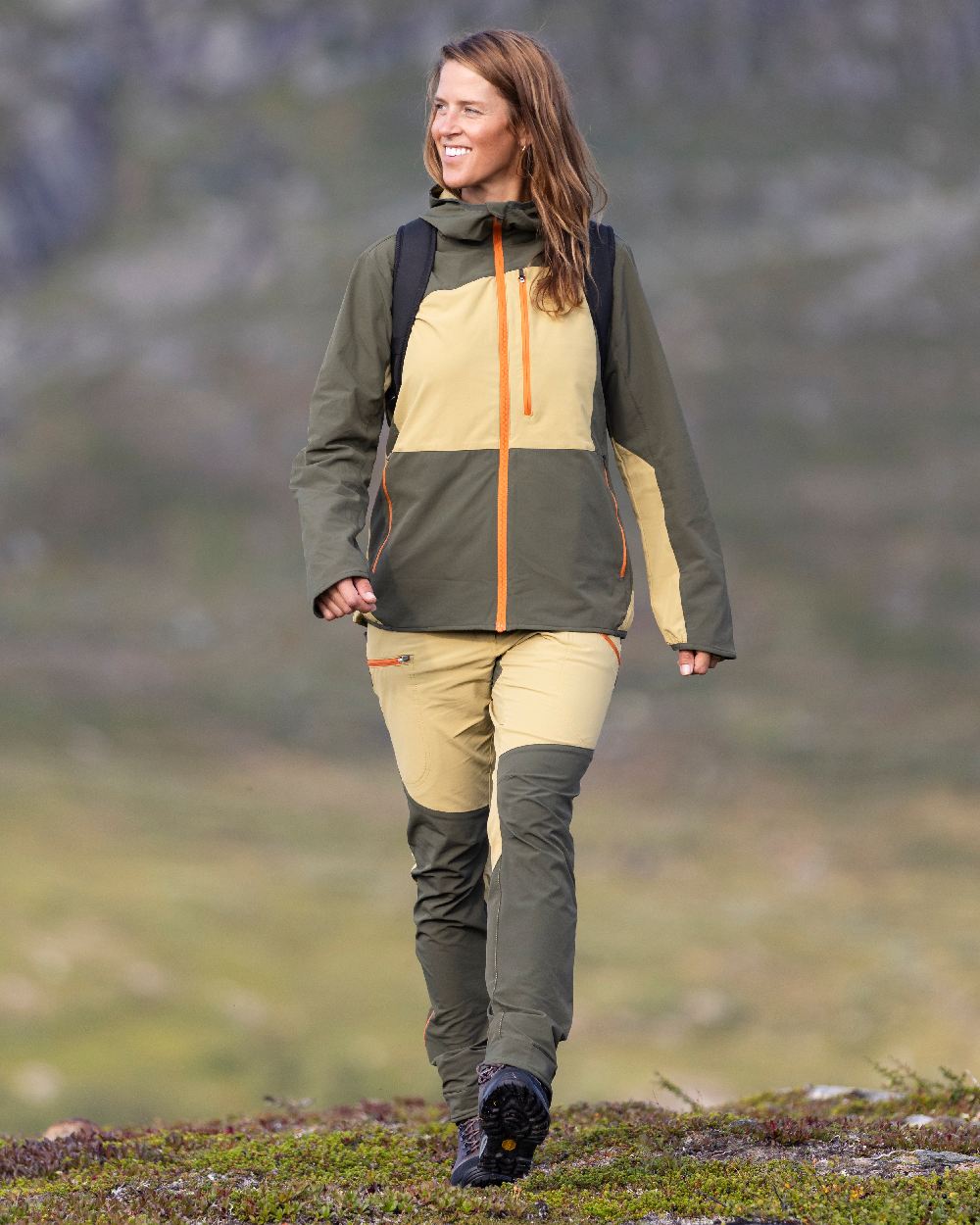 Golden Hay Mossgreen Coloured Pinewood Womens Abisko Light Stretch Jacket on outdoor background 