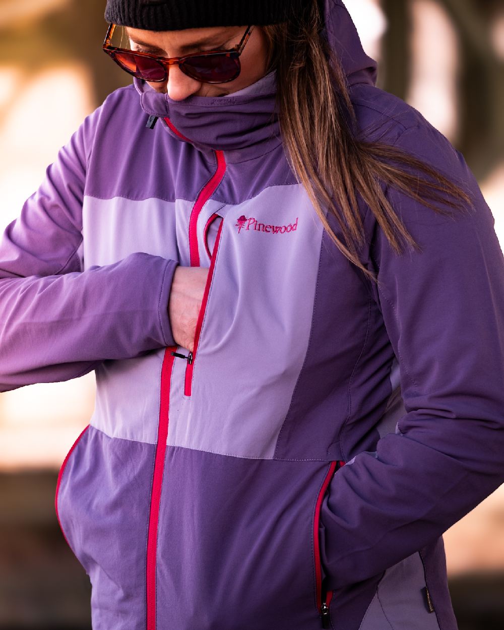 Light Lilac Coloured Pinewood Womens Abisko Light Stretch Jacket on outdoor background 