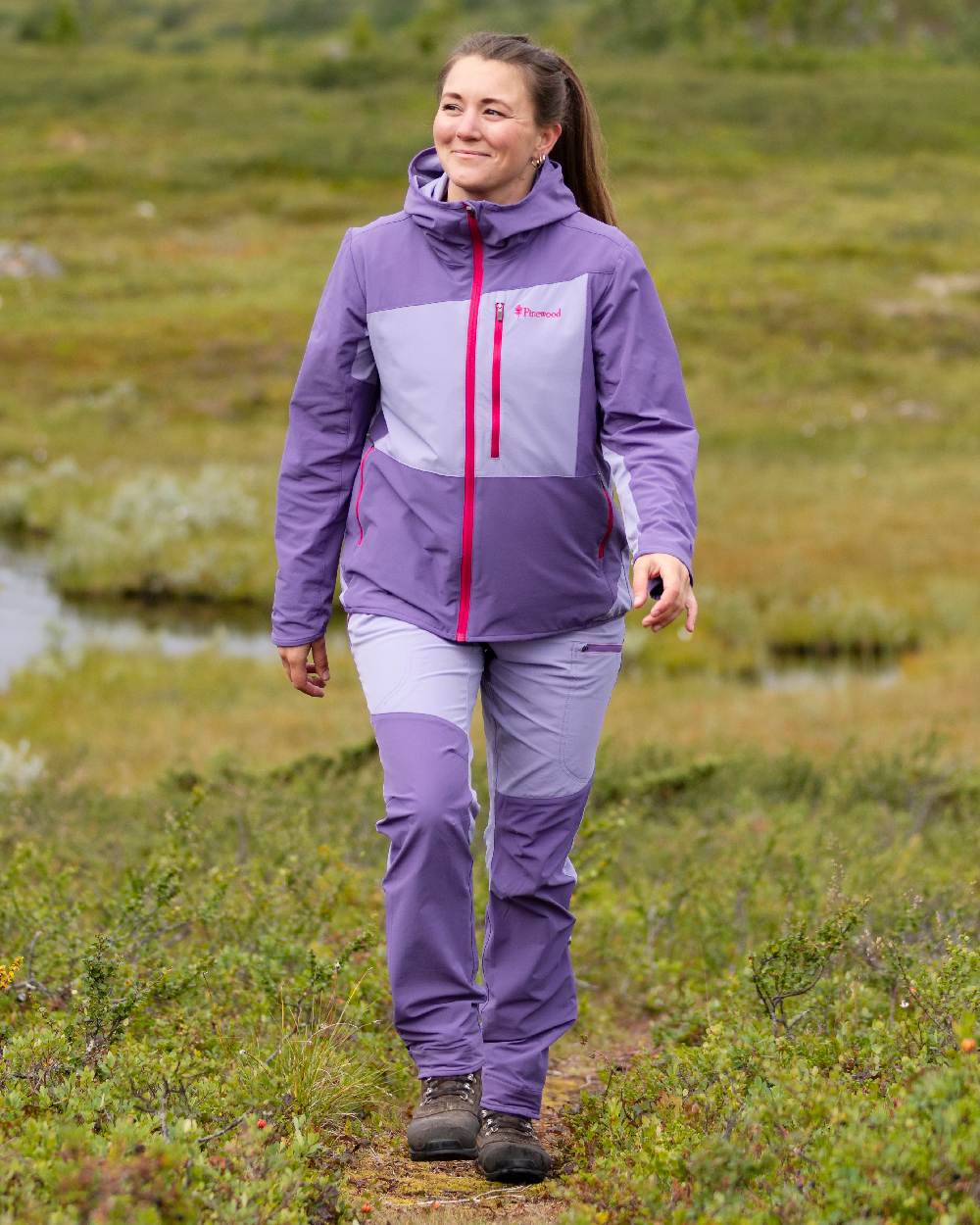 Light Lilac Coloured Pinewood Womens Abisko Light Stretch Jacket on outdoor background 