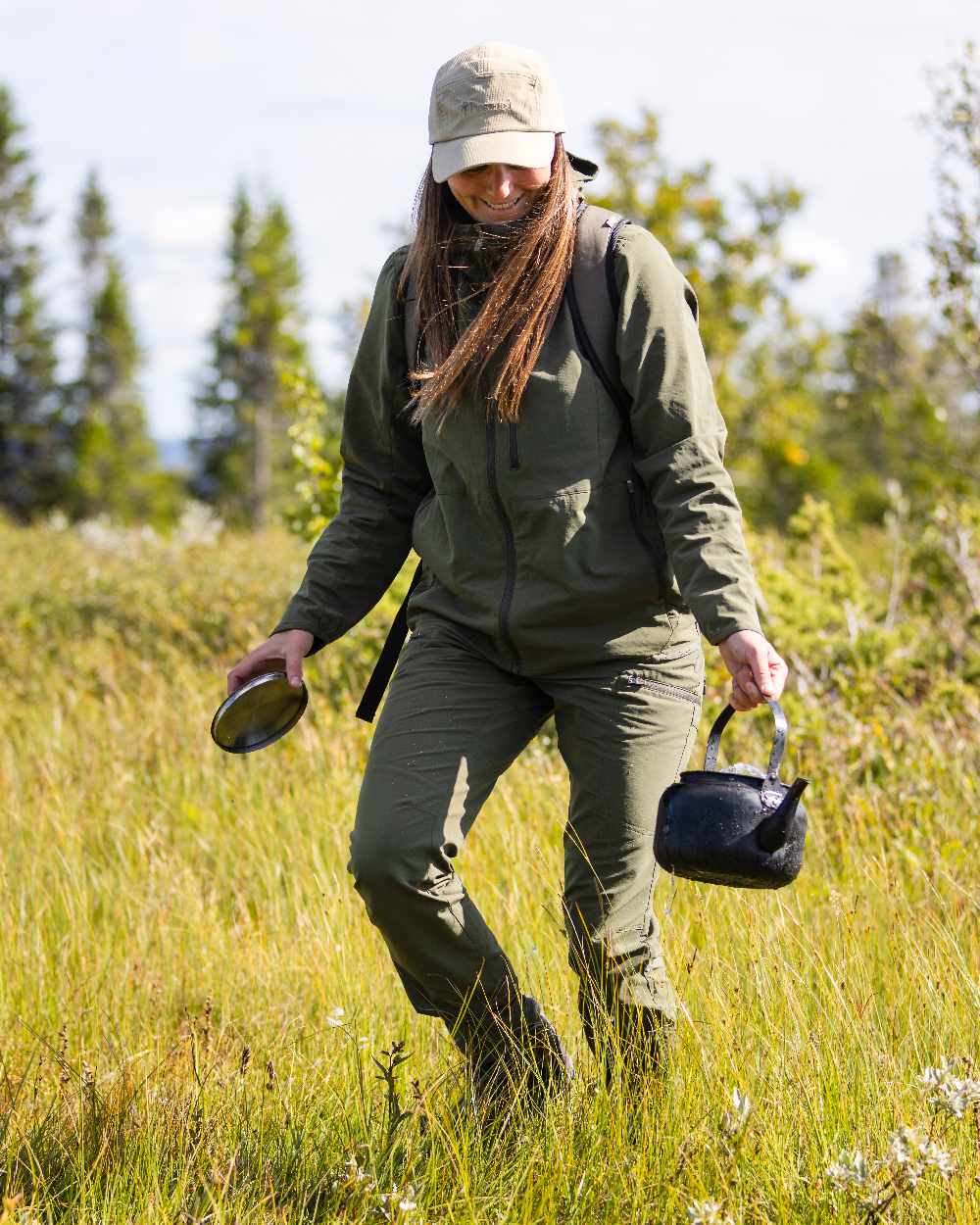 Mossgreen Coloured Pinewood Womens Abisko Light Stretch Jacket on outdoor background 
