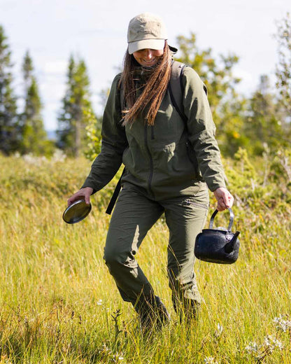 Mossgreen Coloured Pinewood Womens Abisko Light Stretch Jacket on outdoor background 