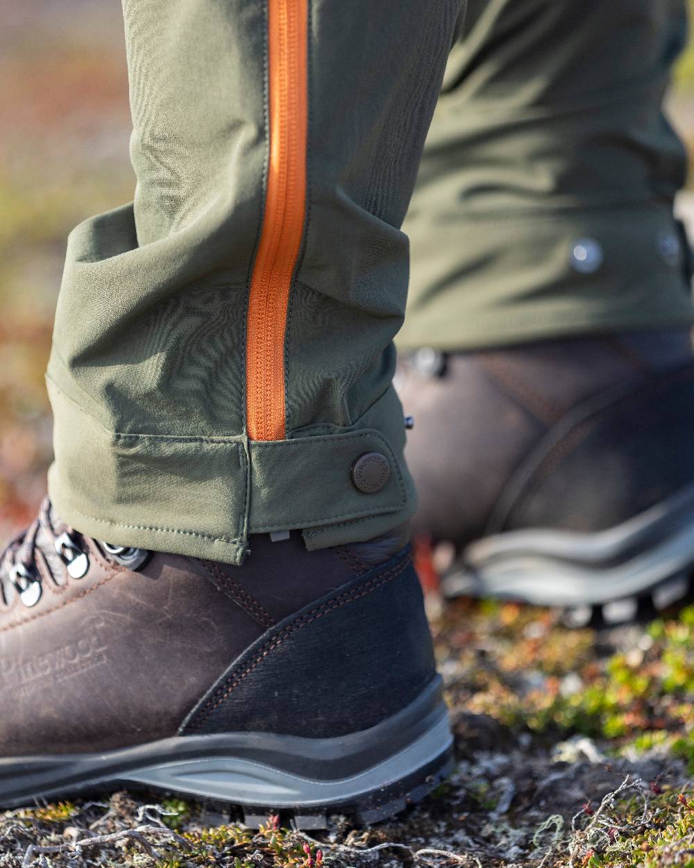 Golden Hay Mossgreen Coloured Pinewood Womens Abisko Light Stretch Trousers on outdoor background 