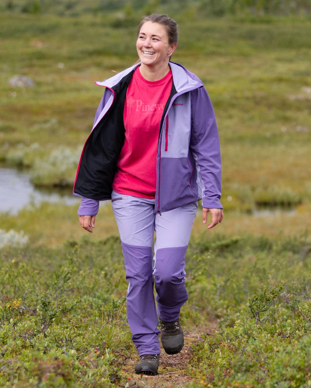 Light Lilac Coloured Pinewood Womens Abisko Light Stretch Trousers on outdoor background 