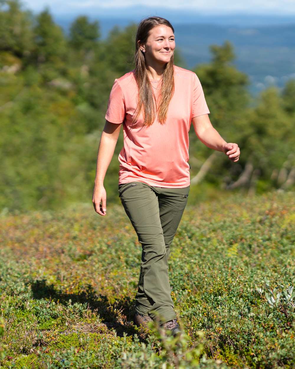 Mossgreen Coloured Pinewood Womens Abisko Light Stretch Trousers on outdoor background 