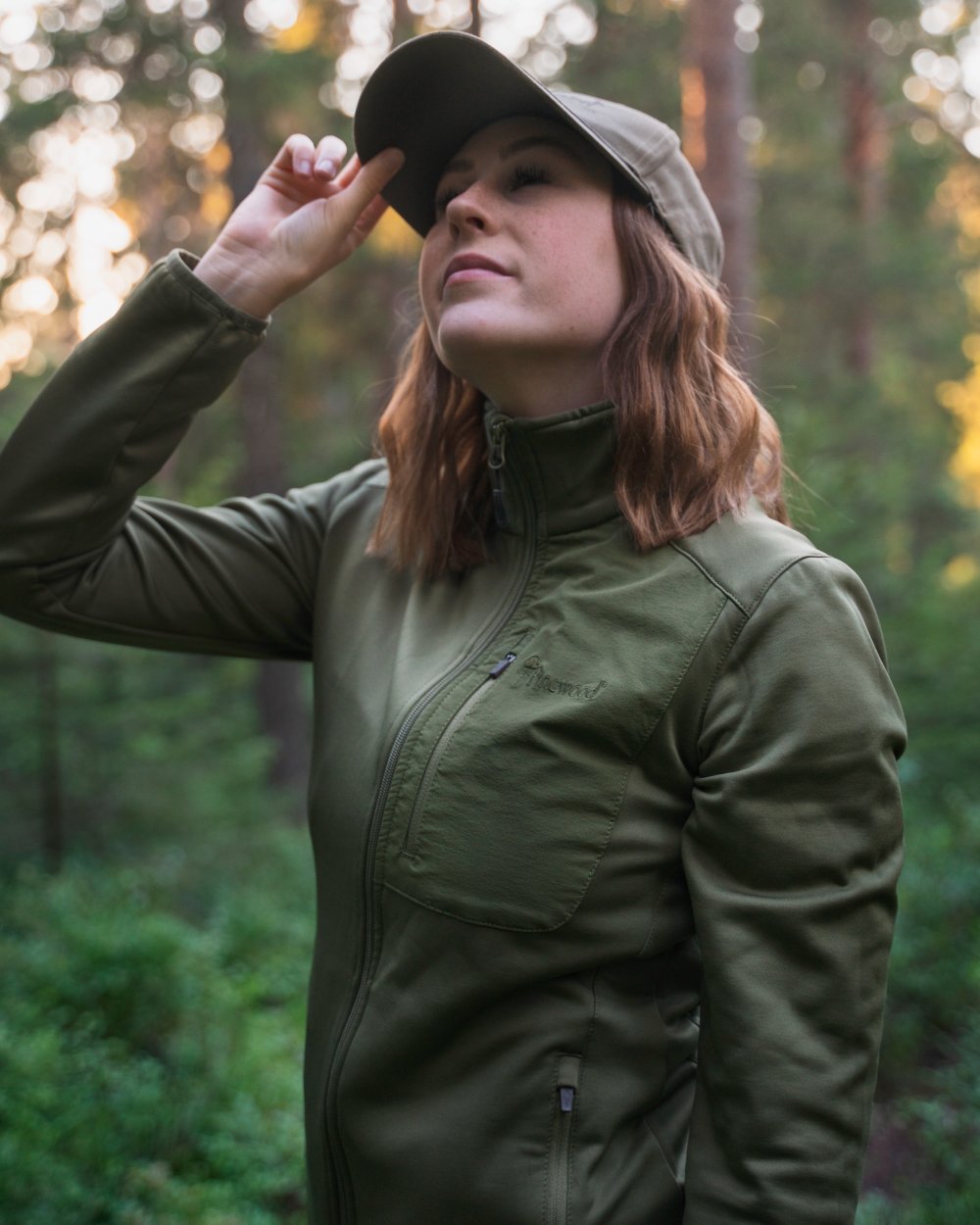 Leaf coloured Pinewood Womens Brenton Power Fleece Jacket on forest background 