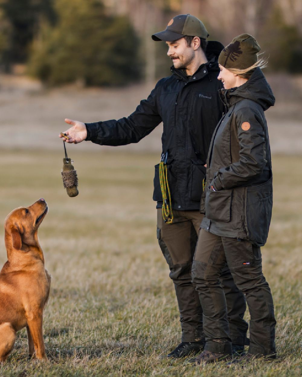 Moss Green Coloured Pinewood Womens Dog Sports Trainer Extreme Jacket on outdoor background 