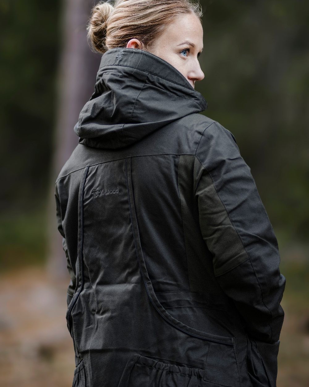Moss Green Coloured Pinewood Womens Dog Sports Trainer Extreme Jacket on outdoor background 