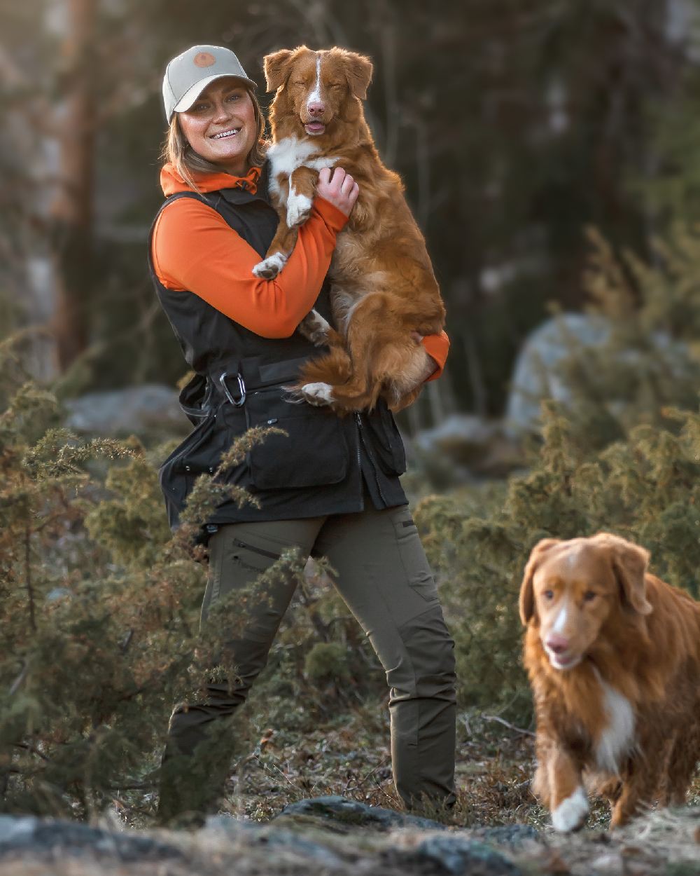 Black Coloured Pinewood Womens Dog Sports Trainer Vest on forest background 