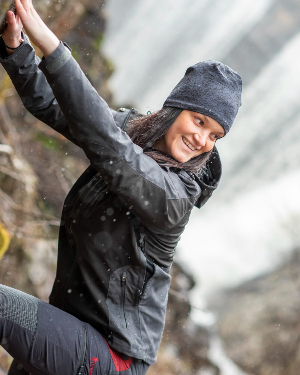 Black Dark Anthracite Coloured Pinewood Womens Finnveden Hybrid Extreme Jacket on outdoor background 