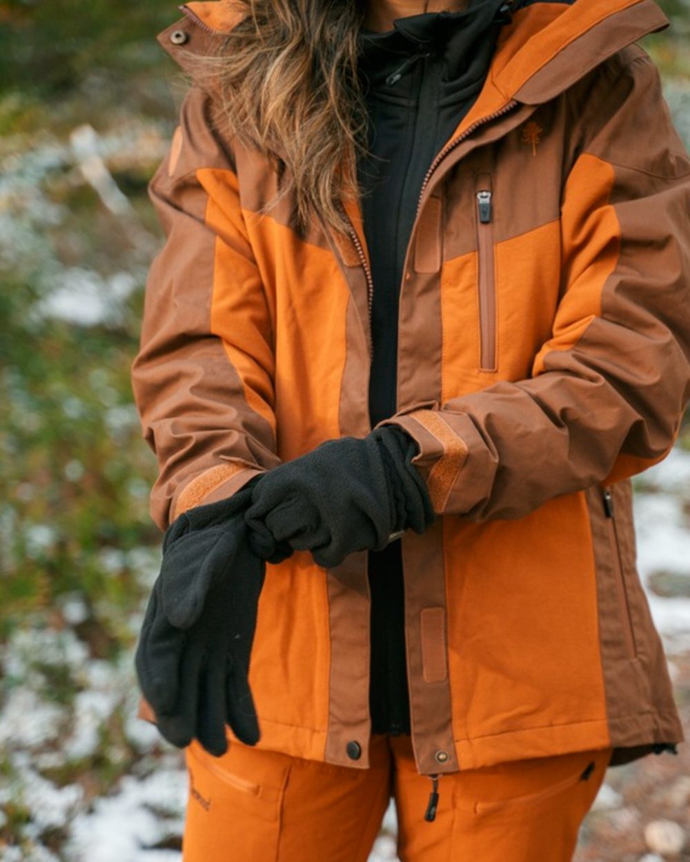 Fudge Nougat Coloured Pinewood Womens Finnveden Hybrid Extreme Jacket on outdoor background 