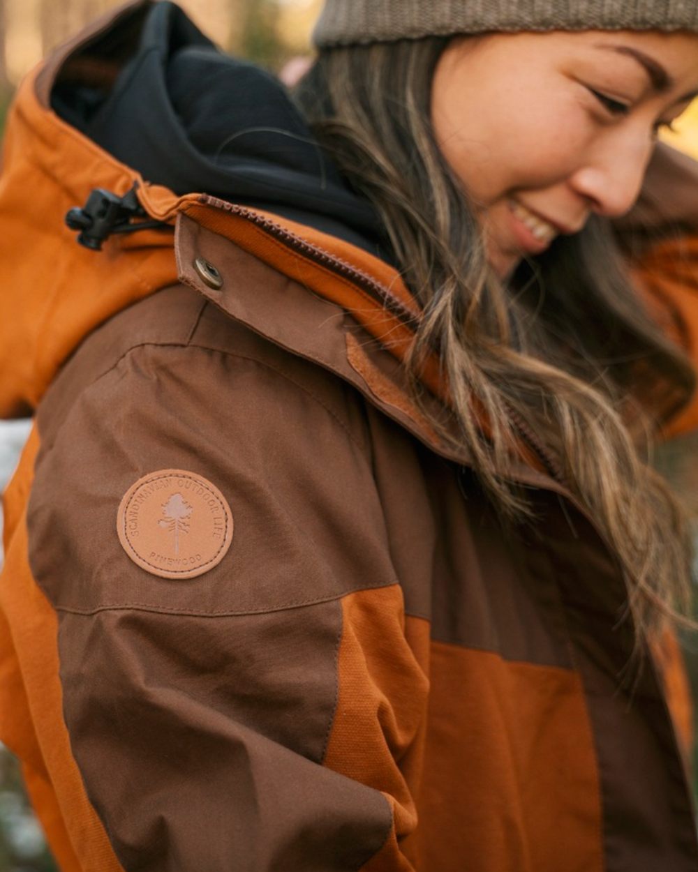 Fudge Nougat Coloured Pinewood Womens Finnveden Hybrid Extreme Jacket on outdoor background 